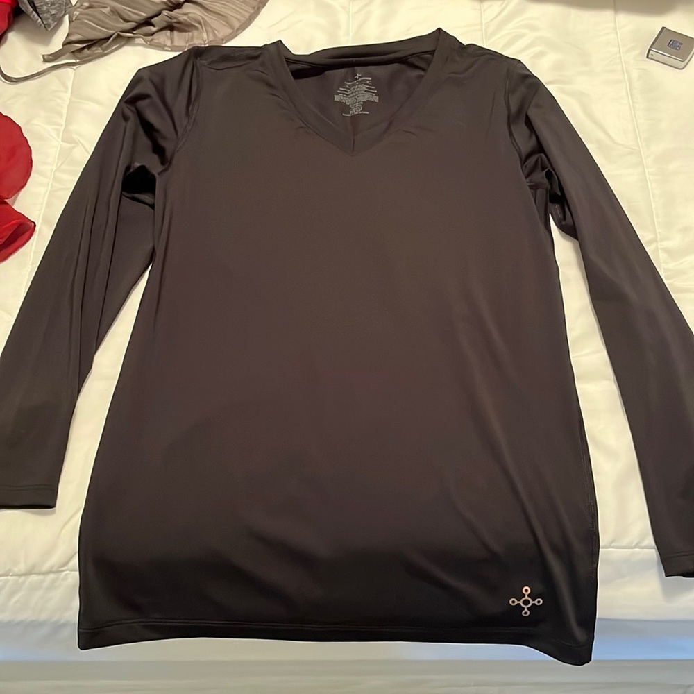 Black tight polyester exercise layering top